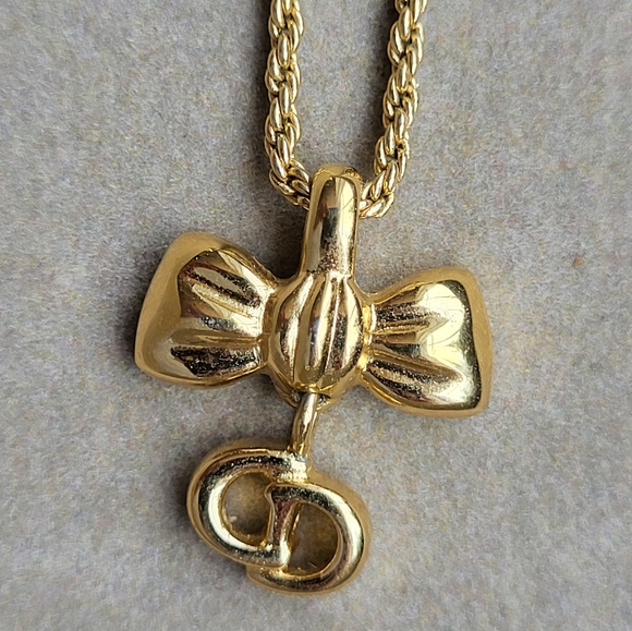 CHRISTIAN DIOR used bow CD necklace - Picture 1 of 5
